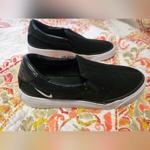 Size 6 Nike Womens Black Slip-On Sneakers, White Accents. See Photos For Wear